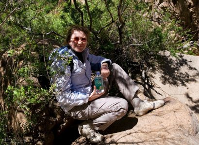 Катя на привале с любимой водой "Fiji".