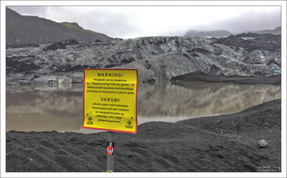 Предупреждающий знак об опасности нахождения рядом с ледником.
